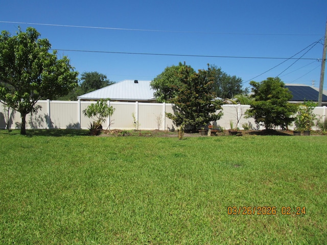 443 SW Homeland Rd, Port Saint Lucie, FL 34953 - view of yard featuring a fenced backyard