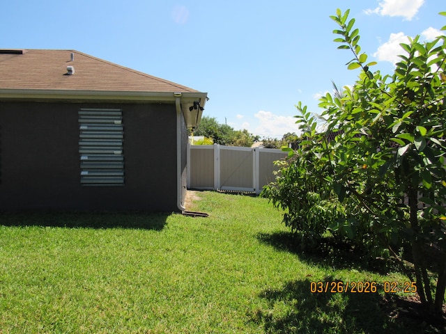 443 SW Homeland Rd, Port Saint Lucie, FL 34953 - view of yard featuring a fenced backyard