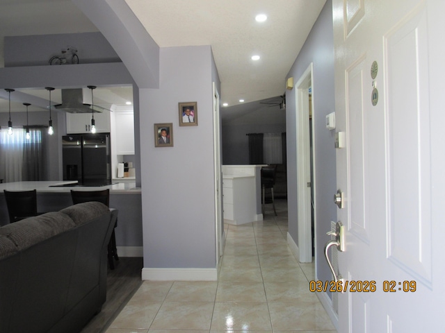 443 SW Homeland Rd, Port Saint Lucie, FL 34953 - hall with baseboards, recessed lighting, and light tile patterned floors