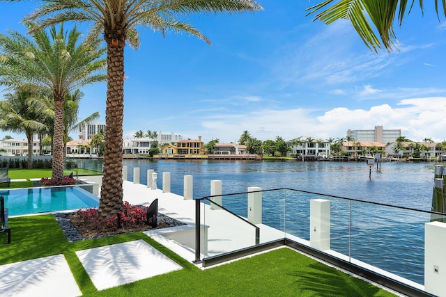 372 E Alexander Palm Rd, Boca Raton, FL 33432 - view of pool featuring a water view, a boat dock, and a yard