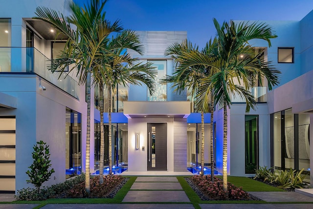 372 E Alexander Palm Rd, Boca Raton, FL 33432 - view of exterior entry featuring stucco siding