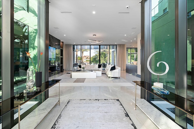 372 E Alexander Palm Rd, Boca Raton, FL 33432 - foyer featuring ceiling fan, recessed lighting, marble finish floor, and floor to ceiling windows