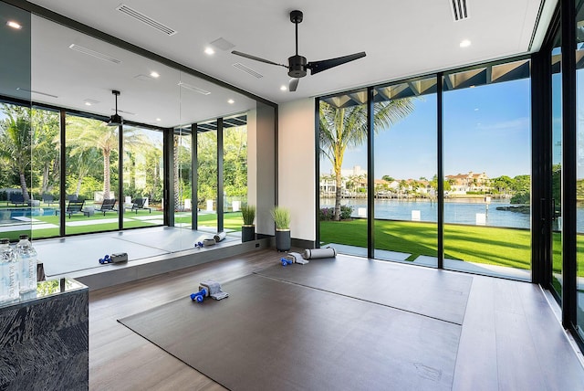 372 E Alexander Palm Rd, Boca Raton, FL 33432 - interior space featuring a water view, visible vents, and a wall of windows
