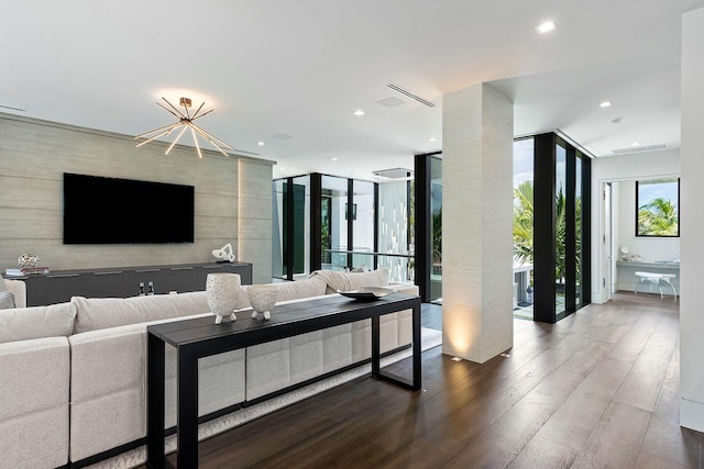372 E Alexander Palm Rd, Boca Raton, FL 33432 - living area with a wall of windows, recessed lighting, a chandelier, and wood finished floors