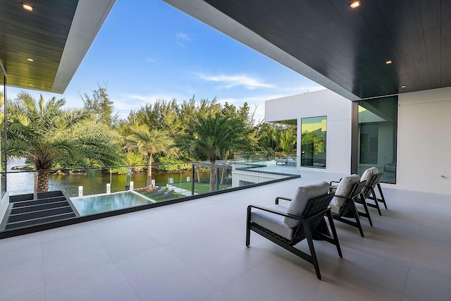 372 E Alexander Palm Rd, Boca Raton, FL 33432 - view of patio / terrace featuring a water view and a balcony