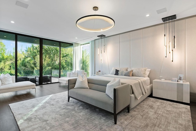 372 E Alexander Palm Rd, Boca Raton, FL 33432 - bedroom featuring light wood-type flooring and floor to ceiling windows