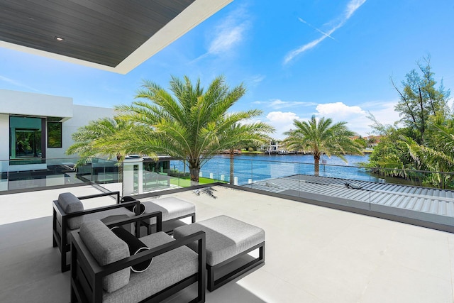372 E Alexander Palm Rd, Boca Raton, FL 33432 - view of patio / terrace featuring a water view