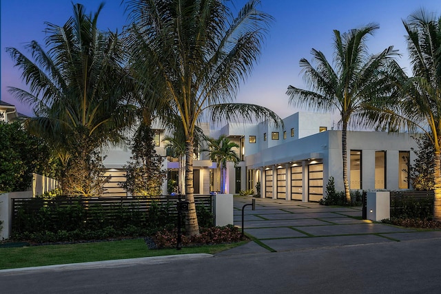 372 E Alexander Palm Rd, Boca Raton, FL 33432 - contemporary house featuring stucco siding and fence