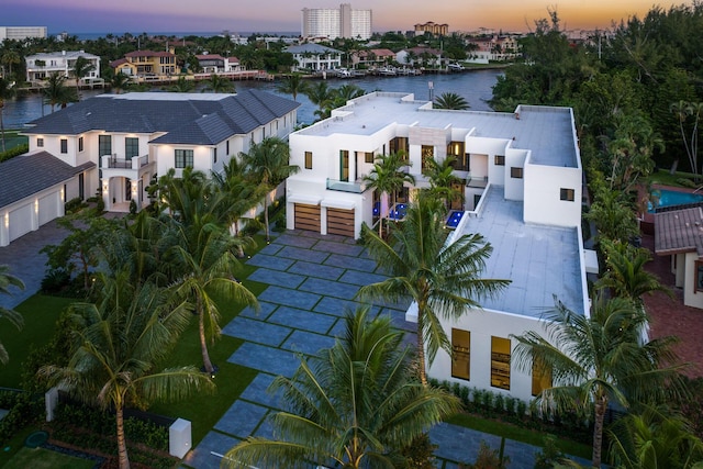372 E Alexander Palm Rd, Boca Raton, FL 33432 - aerial view at dusk featuring a water view