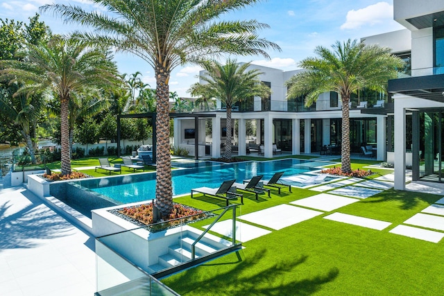 372 E Alexander Palm Rd, Boca Raton, FL 33432 - view of swimming pool with a fenced in pool, a patio, a yard, and fence