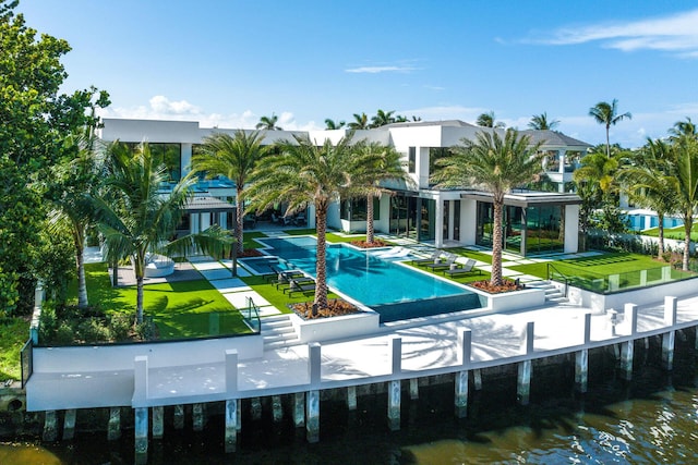 372 E Alexander Palm Rd, Boca Raton, FL 33432 - surrounding community with a swimming pool, a patio area, a water view, and a lawn