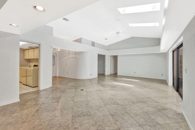 2101 SE Harlow St, Port Saint Lucie, FL 34952 - interior space featuring recessed lighting, light tile patterned floors, lofted ceiling with skylight, visible vents, and washer and dryer