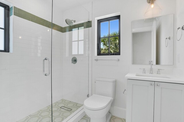3408 Washington Rd, West Palm Beach, FL 33405 - full bathroom with a stall shower, toilet, and vanity