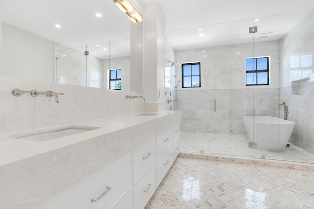 3408 Washington Rd, West Palm Beach, FL 33405 - bathroom with a shower stall, a freestanding bath, double vanity, and recessed lighting