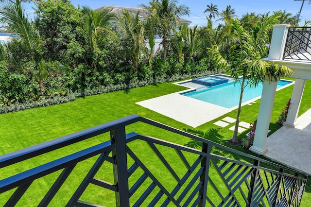 3408 Washington Rd, West Palm Beach, FL 33405 - view of swimming pool with a yard, a patio area, and a pool with connected hot tub