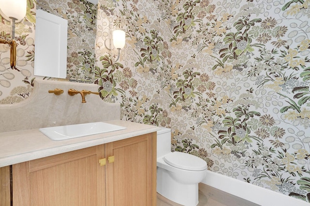 3408 Washington Rd, West Palm Beach, FL 33405 - bathroom featuring wallpapered walls and vanity