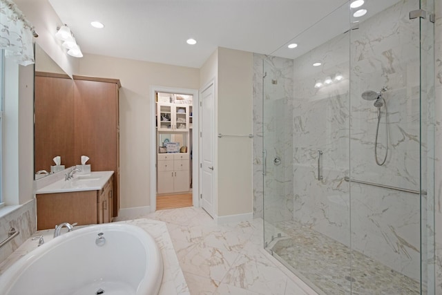 4673 Estates Cir, Westlake, FL 33470 - full bathroom with a marble finish shower, marble finish floors, a garden tub, recessed lighting, and vanity