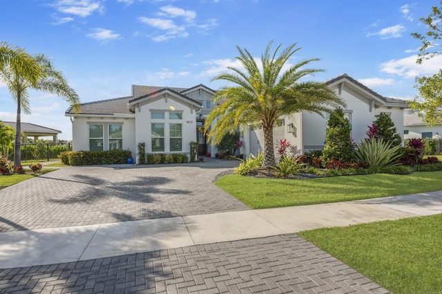 4673 Estates Cir, Westlake, FL 33470 - view of front of property with stucco siding