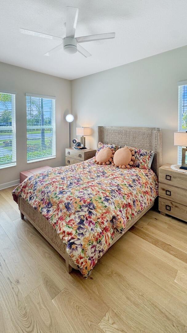 4673 Estates Cir, Westlake, FL 33470 - bedroom featuring wood finished floors and ceiling fan