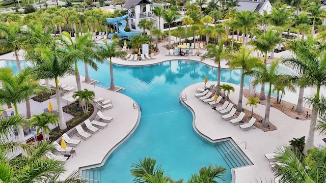 4673 Estates Cir, Westlake, FL 33470 - community pool with a water slide and a patio