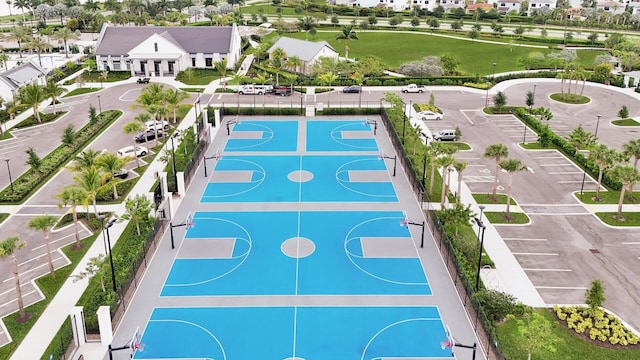4673 Estates Cir, Westlake, FL 33470 - view of sport court with community basketball court, fence, and a residential view