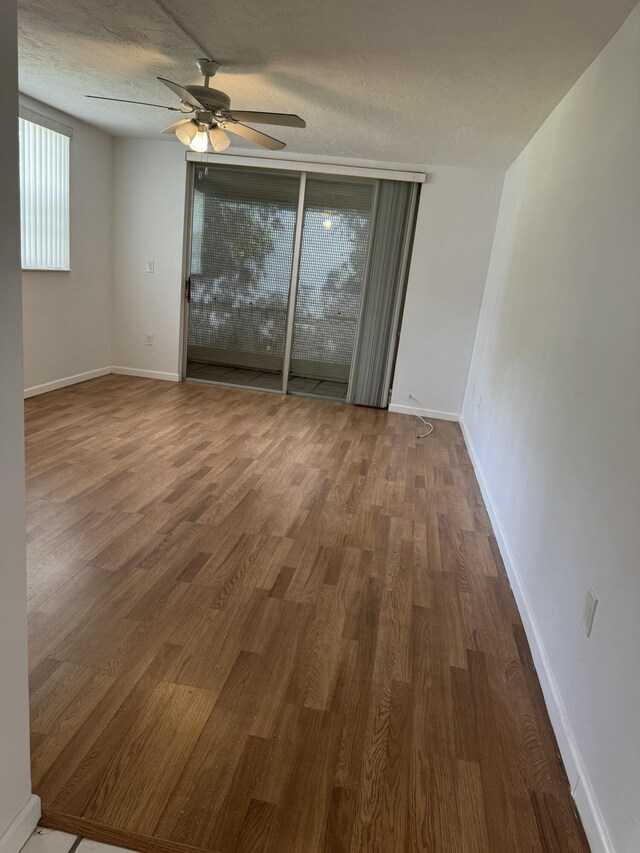 1681 NW 70th Ave Unit 102, Plantation, FL 33313 - spacious closet featuring dark wood-style floors
