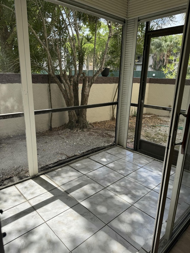 view of unfurnished sunroom