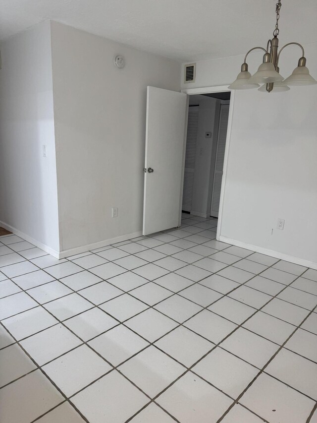 1681 NW 70th Ave Unit 102, Plantation, FL 33313 - spare room with light wood-style flooring, ceiling fan, and baseboards