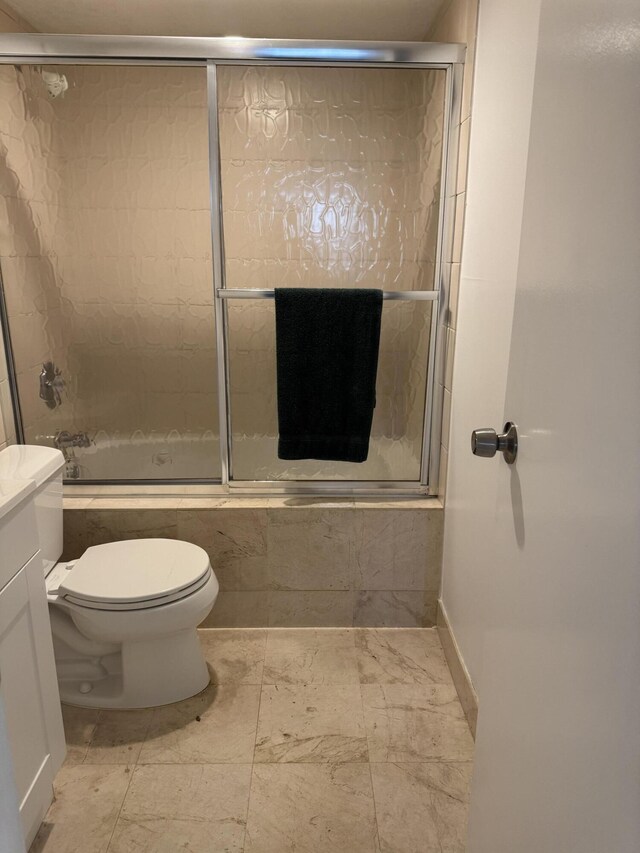 1681 NW 70th Ave Unit 102, Plantation, FL 33313 - empty room with a ceiling fan, baseboards, and wood finished floors