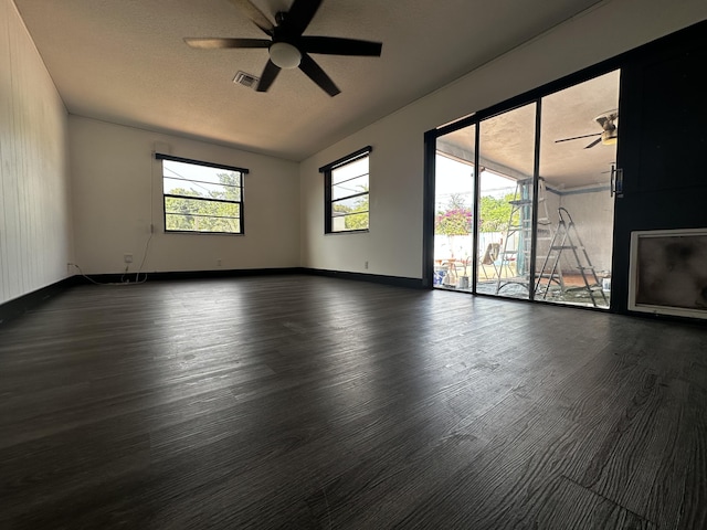 2379 Carambola Rd, West Palm Beach, FL 33406 - spare room with ceiling fan, wood finished floors, and baseboards