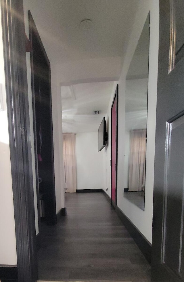 2379 Carambola Rd, West Palm Beach, FL 33406 - hall with dark wood finished floors and baseboards