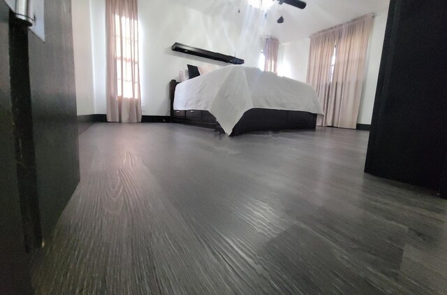 2379 Carambola Rd, West Palm Beach, FL 33406 - bedroom with ceiling fan and baseboards