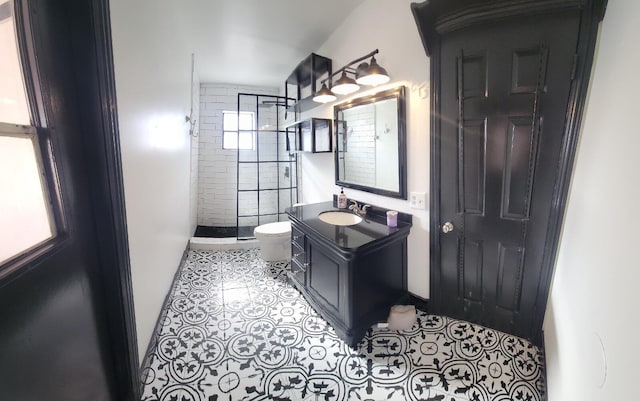 2379 Carambola Rd, West Palm Beach, FL 33406 - bathroom featuring toilet, a shower stall, vanity, and tile patterned flooring