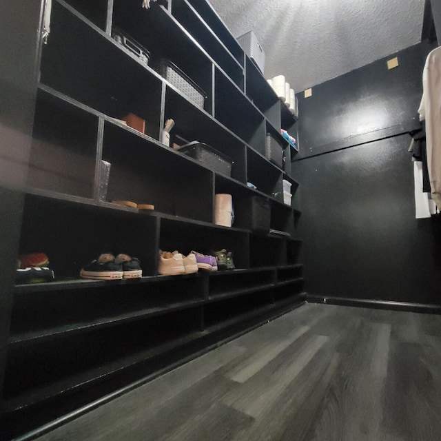 2379 Carambola Rd, West Palm Beach, FL 33406 - spacious closet featuring wood finished floors