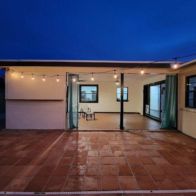 2379 Carambola Rd, West Palm Beach, FL 33406 - patio at twilight featuring a patio area