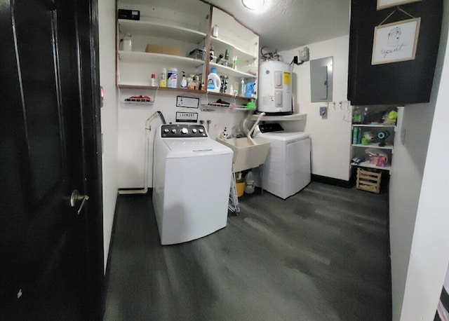 2379 Carambola Rd, West Palm Beach, FL 33406 - laundry room featuring electric panel, washer and dryer, electric water heater, and dark wood finished floors