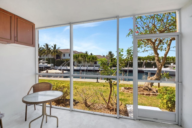sunroom with a water view