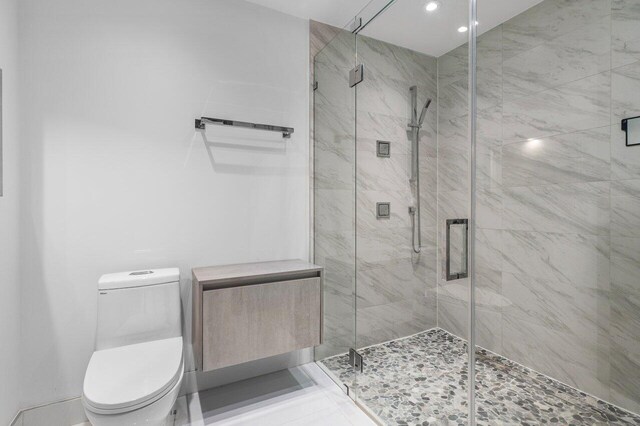 21481 Cypress Hammock Dr Unit 31B, Boca Raton, FL 33428 - bathroom featuring toilet, recessed lighting, and a shower stall
