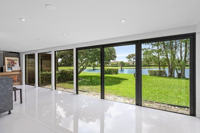 21481 Cypress Hammock Dr Unit 31B, Boca Raton, FL 33428 - doorway with a water view, tile patterned floors, and recessed lighting