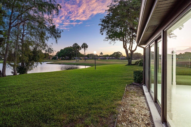 21481 Cypress Hammock Dr Unit 31B, Boca Raton, FL 33428 - yard at dusk featuring a water view