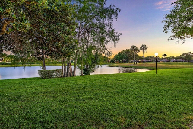 21481 Cypress Hammock Dr Unit 31B, Boca Raton, FL 33428 - view of home's community with a lawn and a water view