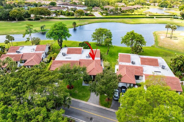 21481 Cypress Hammock Dr Unit 31B, Boca Raton, FL 33428 - bird's eye view with a water view, a residential view, and golf course view