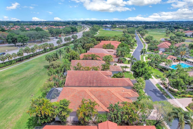 bird's eye view of a golf course and a large body of water