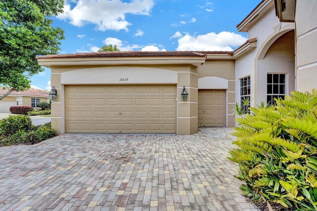 garage featuring driveway
