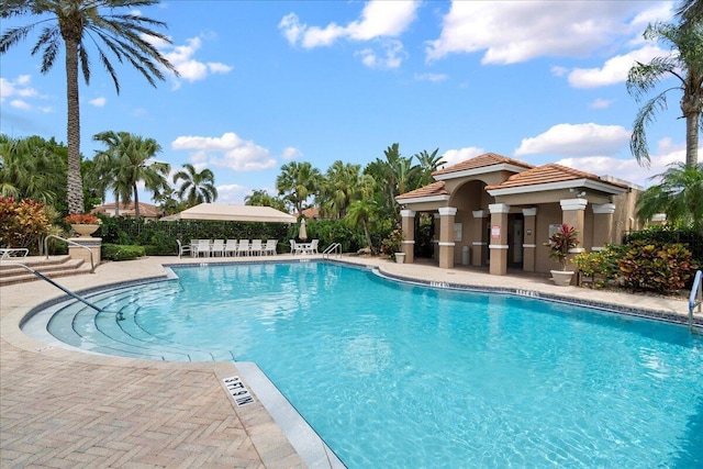 10839 Royal Devon Way, Lake Worth, FL 33449 - community pool featuring a patio