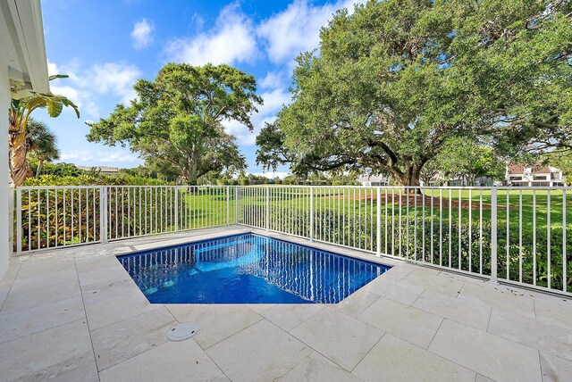 17065 Bay St, Jupiter, FL 33477 - view of swimming pool with a fenced in pool, a patio, and fence