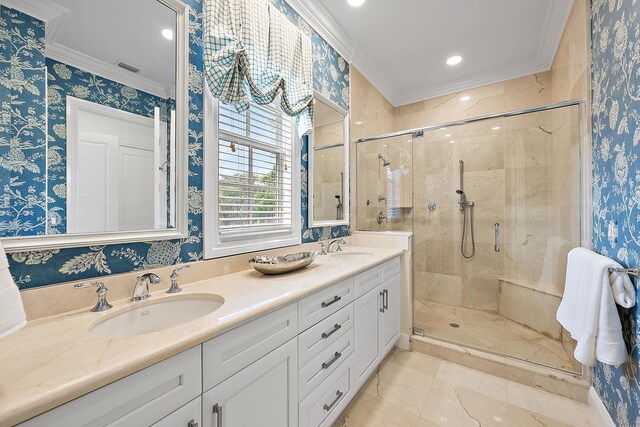 17065 Bay St, Jupiter, FL 33477 - bathroom featuring wallpapered walls, a stall shower, a sink, and ornamental molding