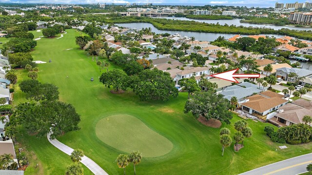 17065 Bay St, Jupiter, FL 33477 - drone / aerial view featuring a water view, golf course view, and a residential view