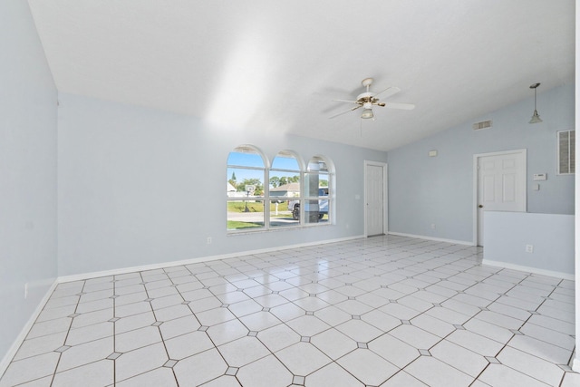 interior space featuring baseboards, lofted ceiling, a ceiling fan, and visible vents