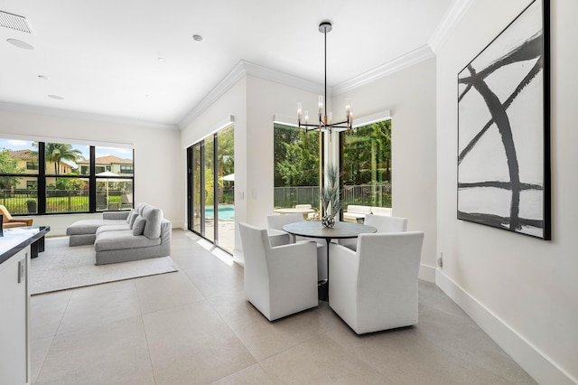 16491 Gateway Bridge Dr, Delray Beach, FL 33446 - dining area with ornamental molding, a chandelier, and baseboards